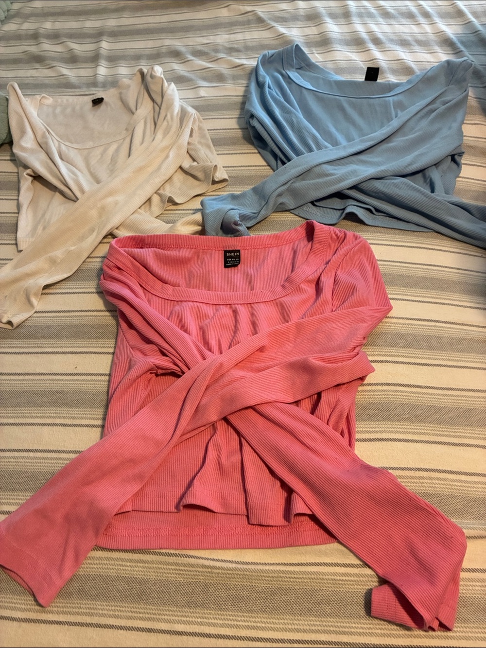 a new day Off-the-Shoulder Ribbed Sweater Trio - Pink, Light Blue, Cream